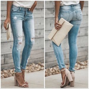 RESTOCKED! Distressed skinny jeans in medium wash